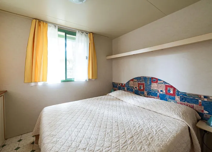 Aldeamento Turístico Villaggio Punta Lunga 3*