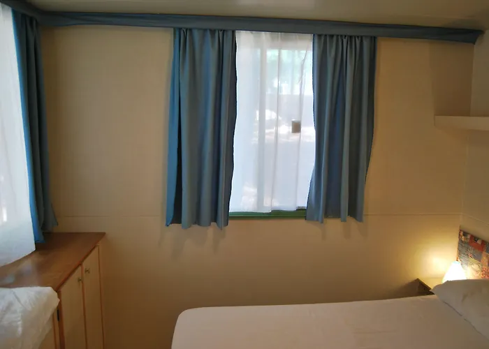 Aldeamento Turístico Villaggio Punta Lunga 3*